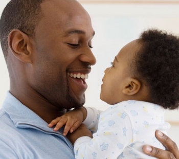 Tips for new parents on how to lift properly to prevent back pain